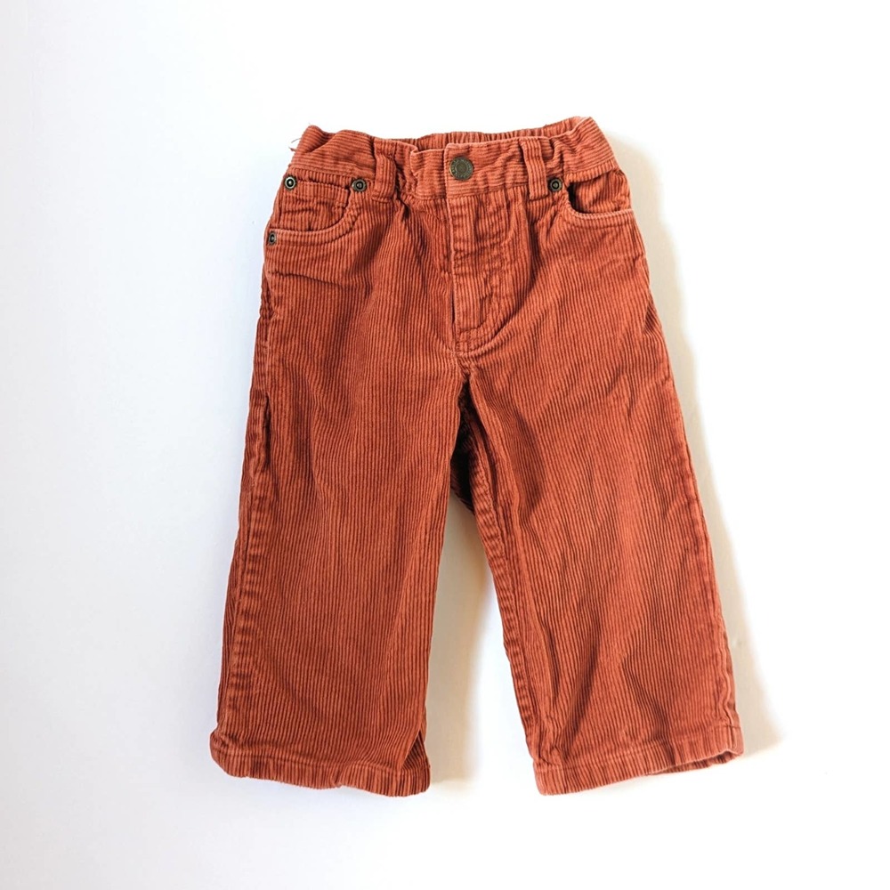 EUC 12-18M corduroy pants in orangey-rust-brown